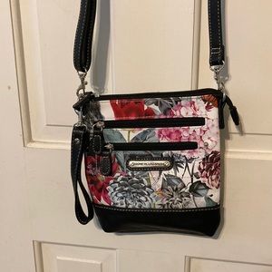 Brand: Stone Mountain USA, Condition: new. Crossbody and adjustable strap.